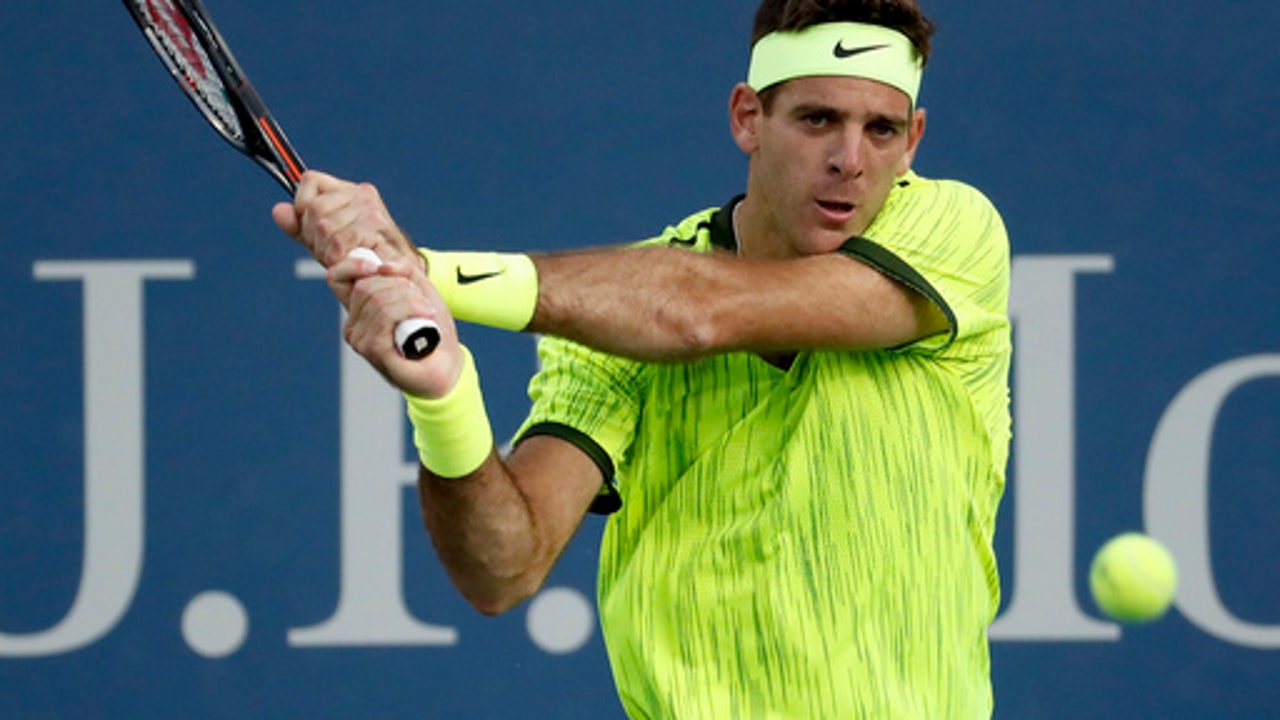The Latest: Rain suspends play on US Open outer courts